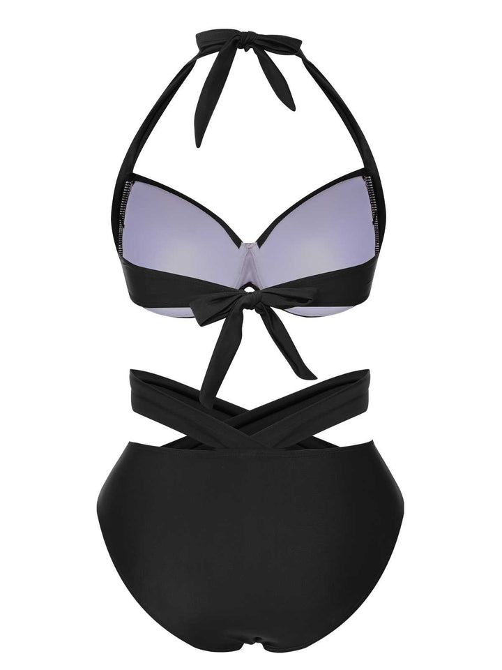 This 1960s Halter Solid Swimsuit carries 1960s vacation dreams in every stitch