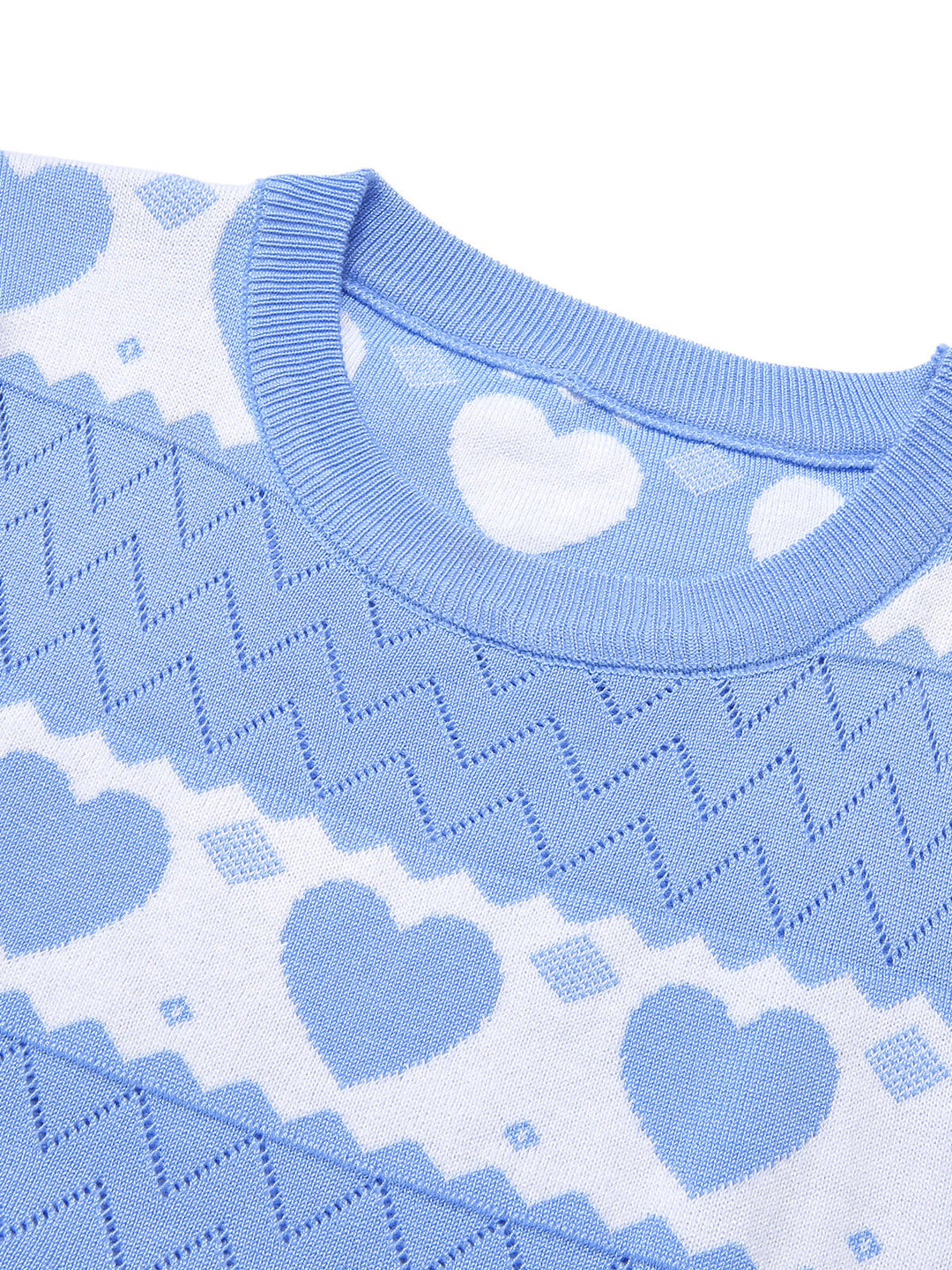 She slips into this 1960s Heart Short Sleeved Knitted Dress and suddenly it&