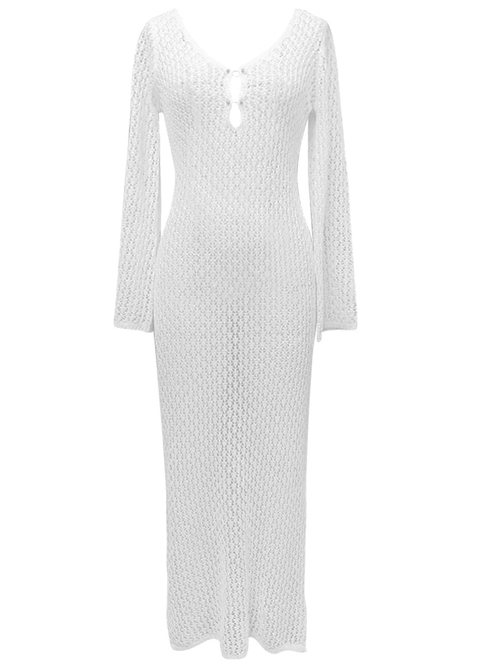 She slips into this 1960s Hollow Knitted Maxi Dress Cover-Up and suddenly it&