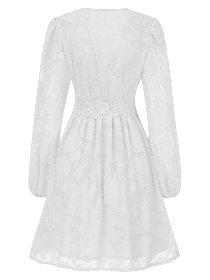 She slips into this 1960s Jaquard Floral Deep V-Neck Skater Dress and suddenly it&