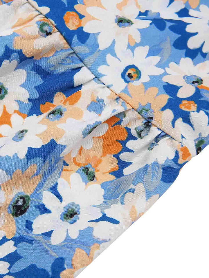 She slips into this 1960s Oil Painting Daisy Shoulder Tie Dress and suddenly it&