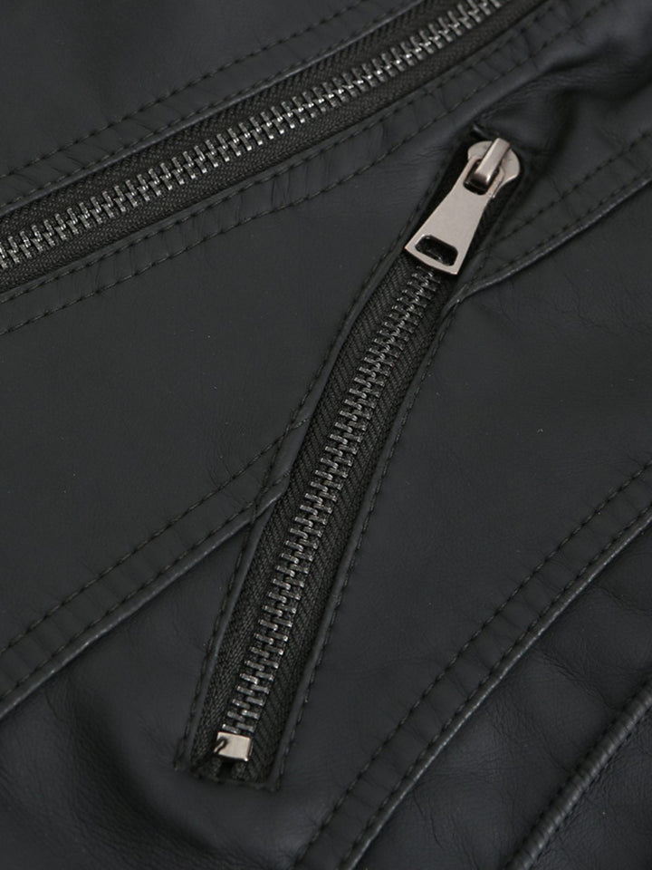 She throws on this 1960s Solid Faux Leather Motorcycle Jacket and the city feels like 1960s Paris