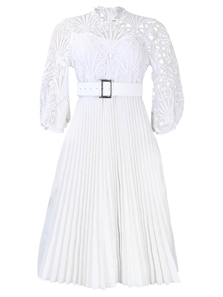 She slips into this 1960s Solid Lace Crochet Pleated Belted Dress and suddenly it&