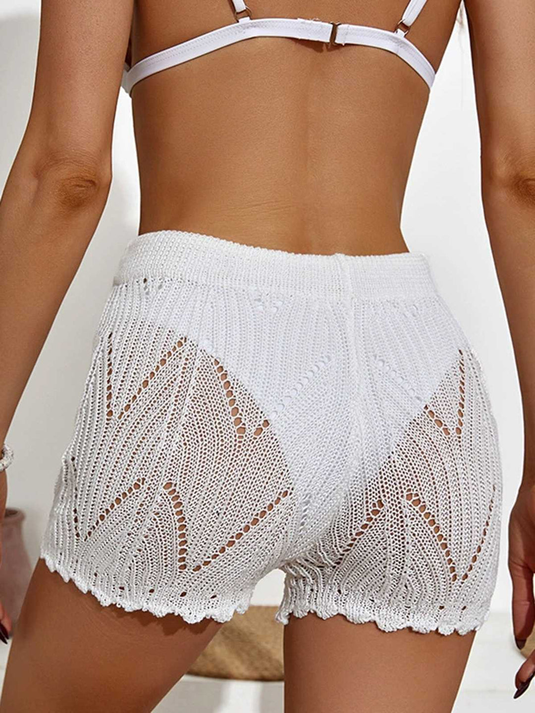 This 1960s Solid Lace-Up Hollow Crochet Shorts whispers 1960s secrets to those who notice