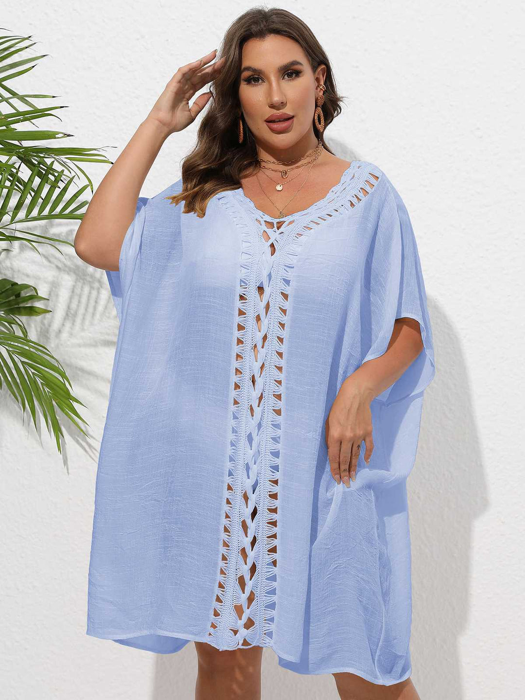 She finds her story in this Solid Patchwork Loose Cover-Up