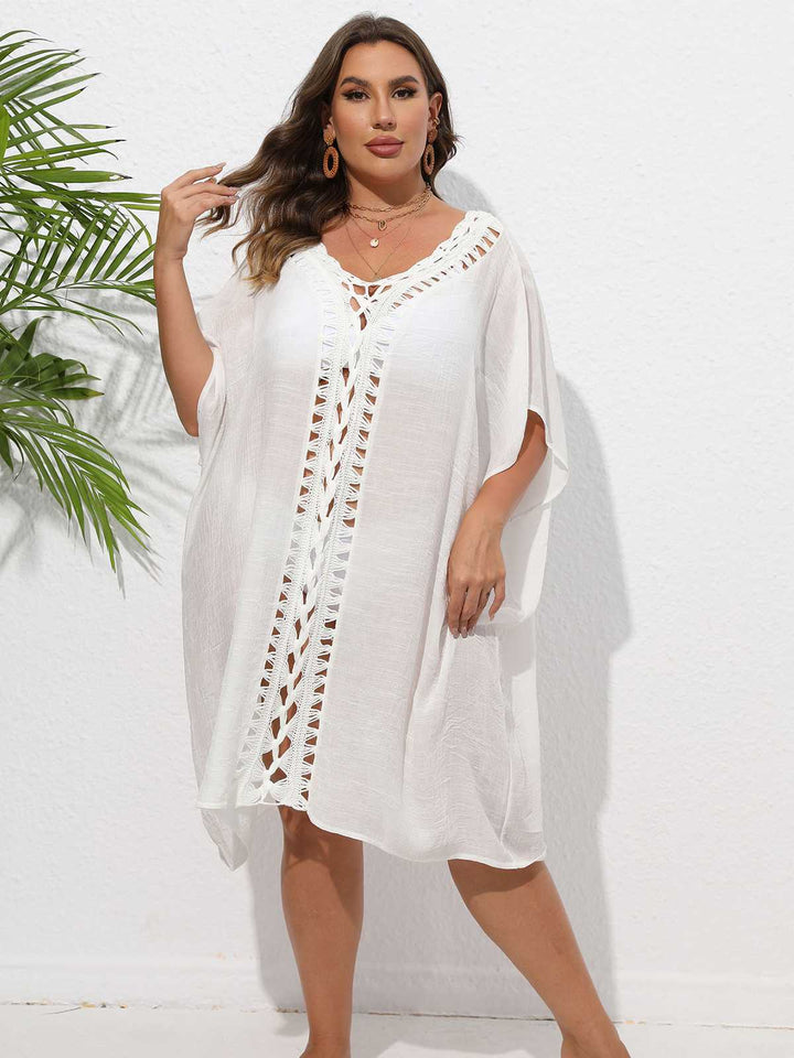 She finds her story in this Solid Patchwork Loose Cover-Up
