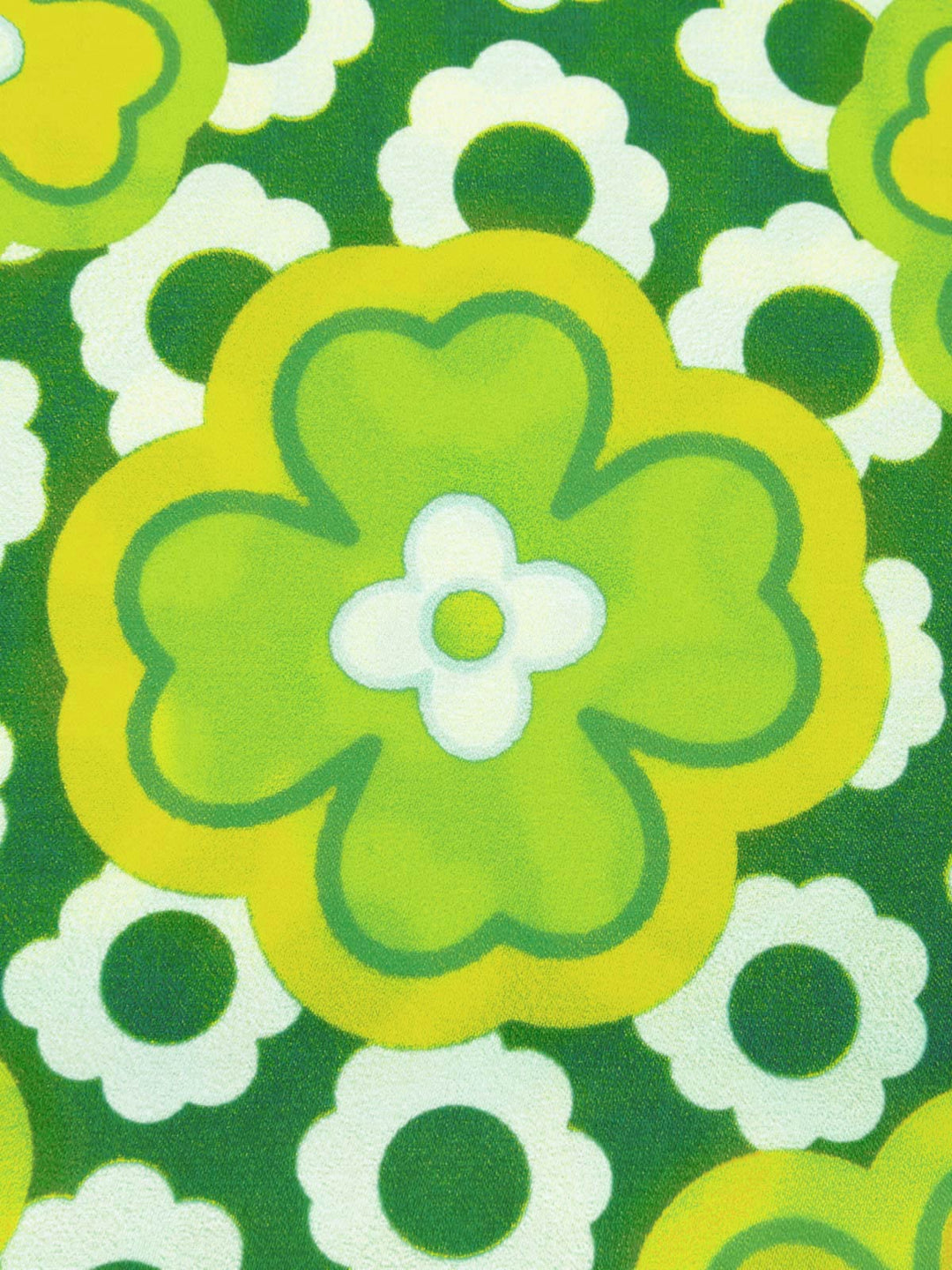 She pairs this 1960s Tie Neck Floral Sleeveless Top with confidence and 1960s charm