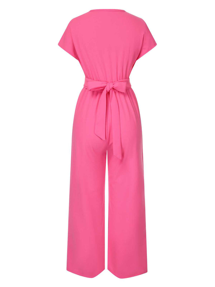 This 1960s V-Neck Belted Solid Jumpsuit carries 1960s stories waiting to be told