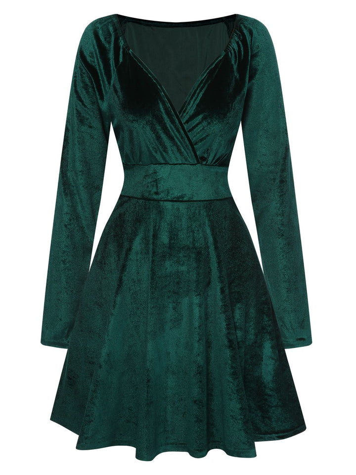 She slips into this 1960s V-Neck Velvet Long Sleeve A-Line Dress and suddenly it&
