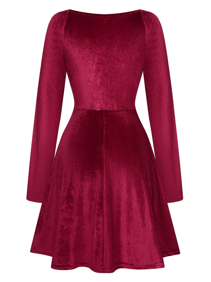 She slips into this 1960s V-Neck Velvet Long Sleeve A-Line Dress and suddenly it&
