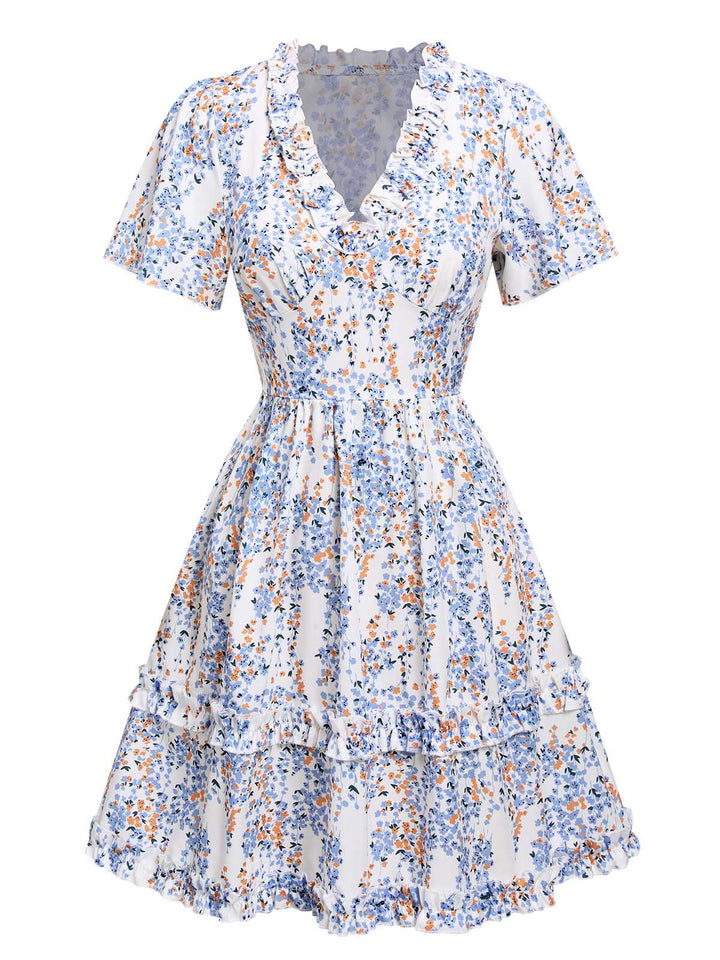 She slips into this 1970s V-Neck Ditsy Floral Wrinkle Dress and suddenly it&