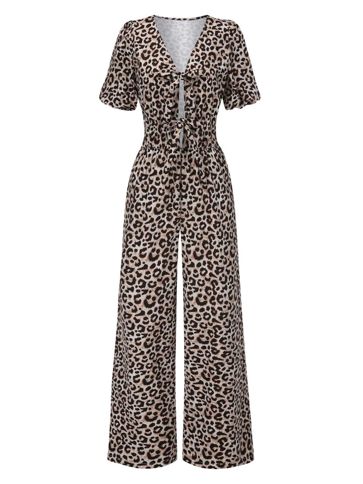 She finds her 1970s story in this 1970s V-Neck Puff Sleeve Leopard Jumpsuit