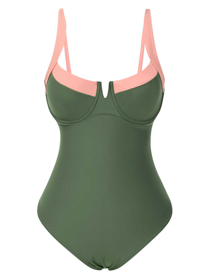 This 1980s Colorblock Strap High-Leg One-Piece Swimsuit carries 1980s vacation dreams in every stitch