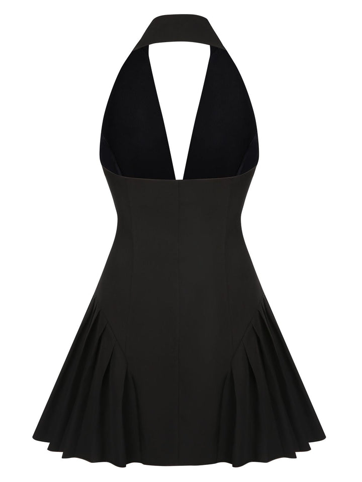 She slips into this 1980s Halter V-Neck Backless Sleeveless Solid Dress and suddenly it&