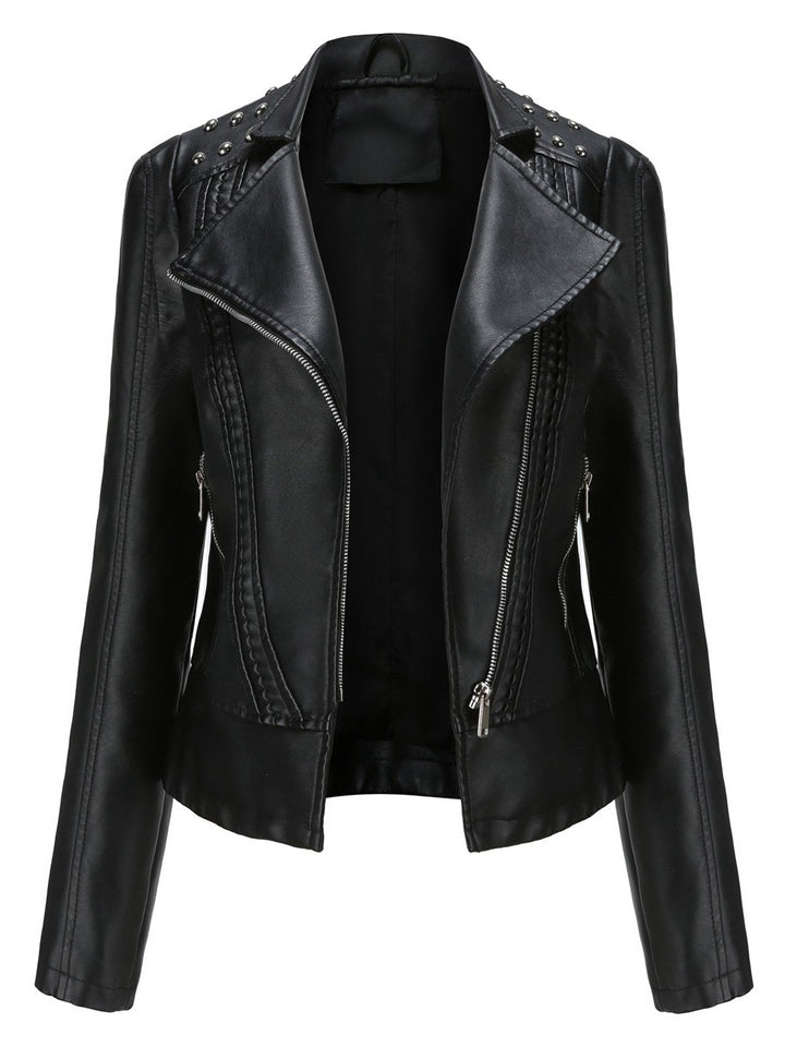 She throws on this 1980s Solid Lapel Leather Jacket and the city feels like 1980s Paris