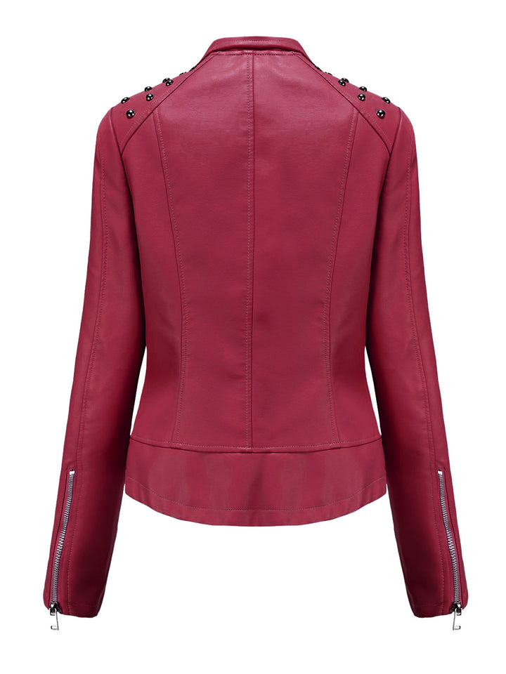 She throws on this 1980s Solid Lapel Leather Jacket and the city feels like 1980s Paris