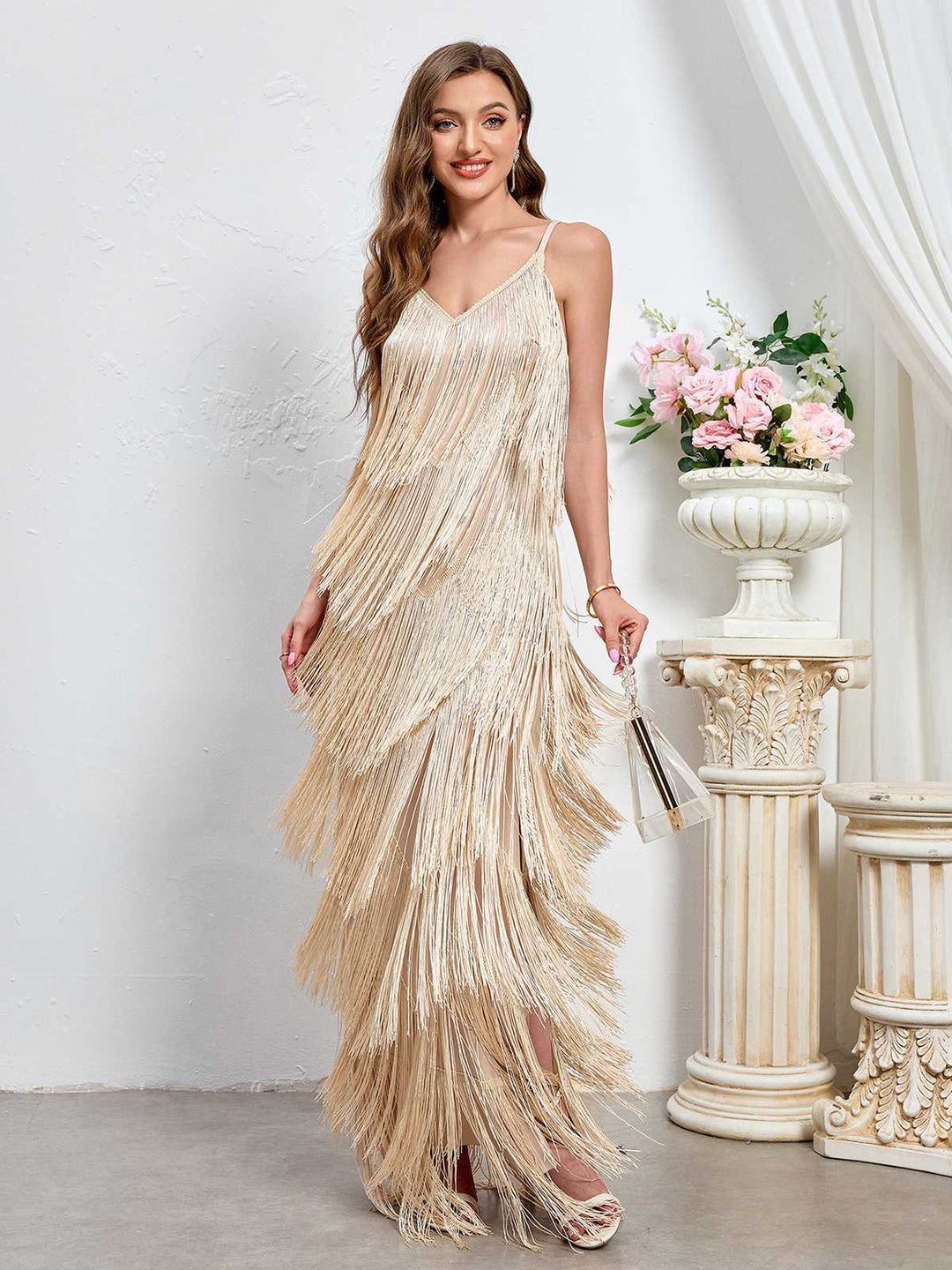 She slips into this Beige 1920s Tassel Spaghetti Straps Maxi Dress and suddenly it&