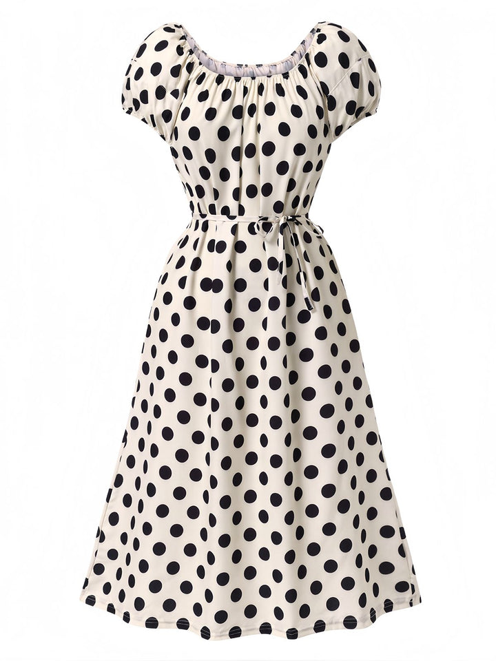 She slips into this Beige 1940s Polka Dot Puff Sleeves Dress and suddenly it&