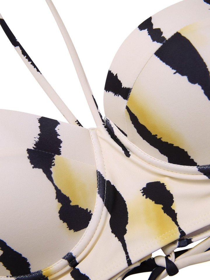 This Beige 1950s Back Cross Straps Ink Splash Swimsuit carries 1950s vacation dreams in every stitch
