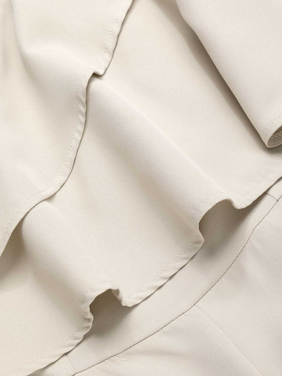 This Beige 1970s One-Shoulder Tiered Ruffles Jumpsuit whispers 1970s secrets to those who notice