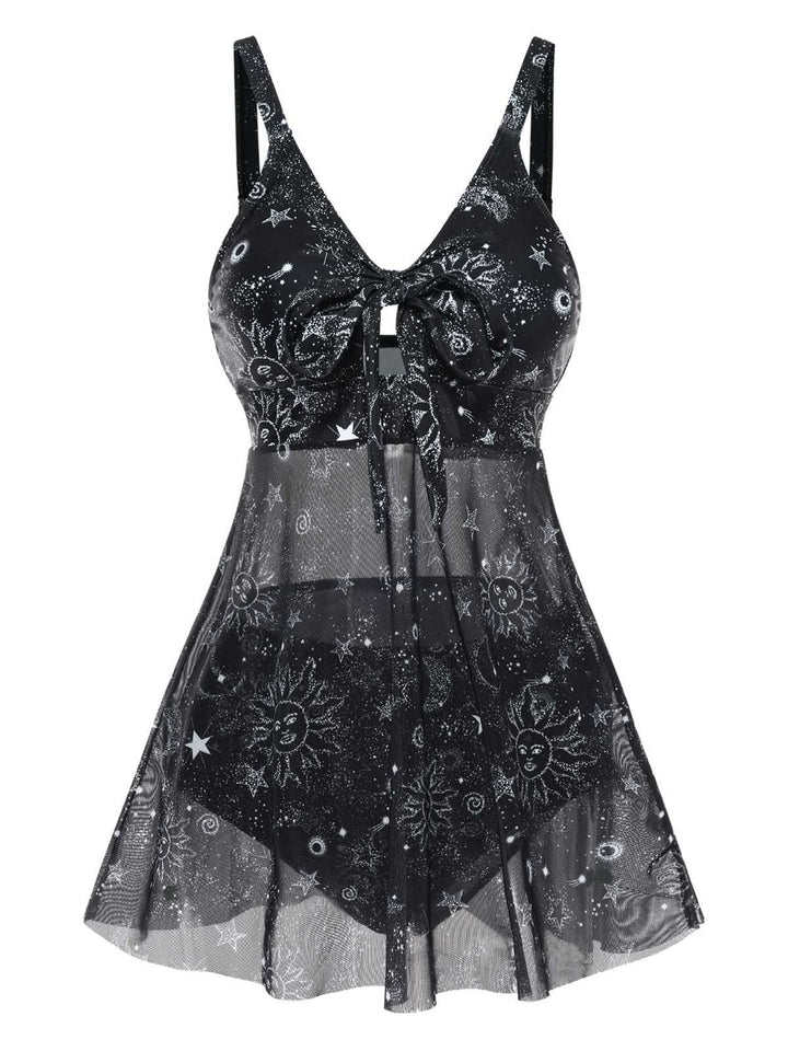 She slips into this Black Mesh Hollow-Out Sun Moon Print Swimdress and suddenly it&