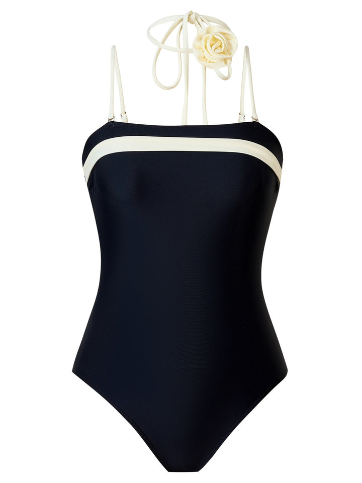 This Black 1940s Contrast 3D Rose Belted Swimsuit carries 1940s vacation dreams in every stitch