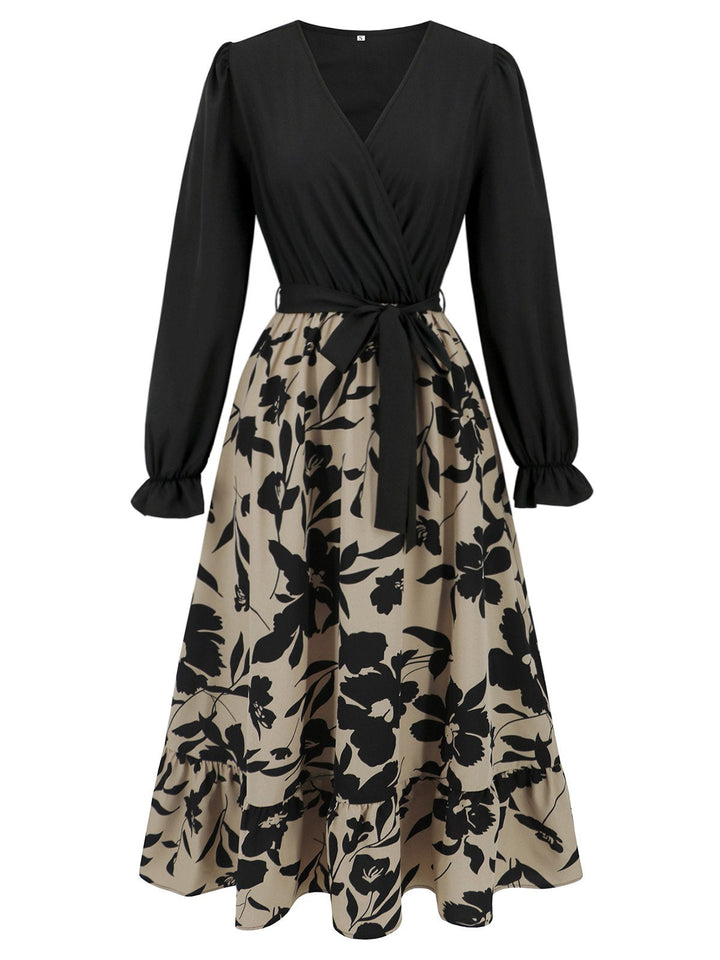 She slips into this Black 1940s Floral Silhouette Long Sleeved Dress and suddenly it&