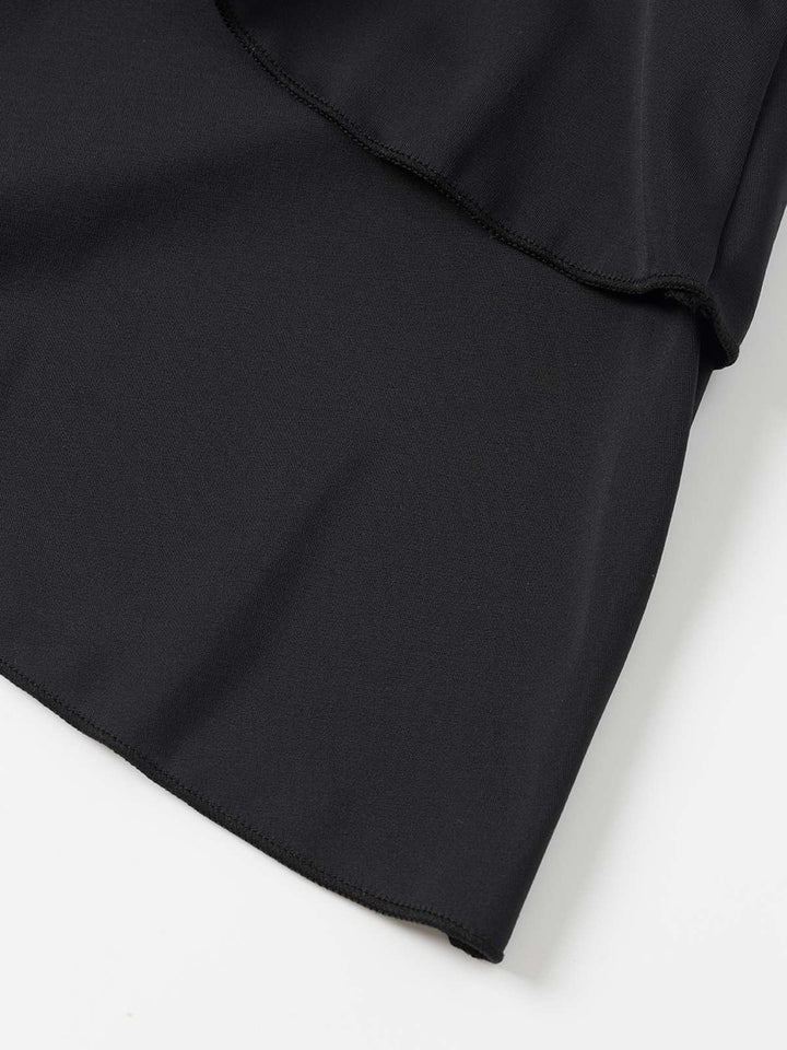 Black 1940s Layered Hem Halter Swimdress — a 1940s silhouette that turns sidewalks into runways