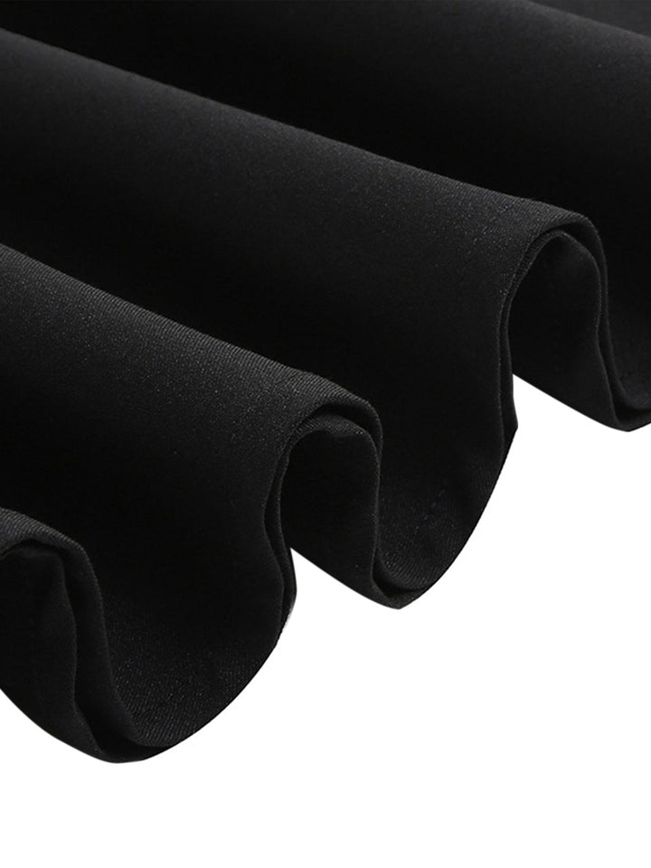 This Black 1940s Solid Buttoned Lapel Dress wraps her in 1940s elegance, one twirl at a time