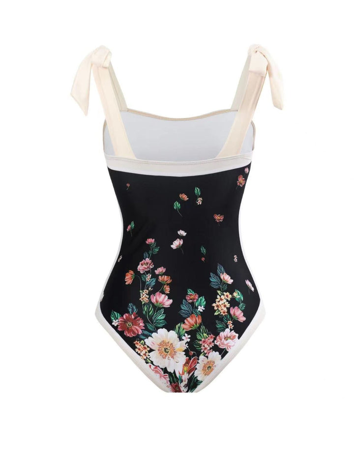 This Black 1940s Strap Bow Floral Swimsuit &amp; Cove-Up carries 1940s vacation dreams in every stitch