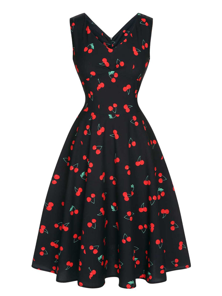 She slips into this Black 1950s Cherry Sleeveless Dress and suddenly it&
