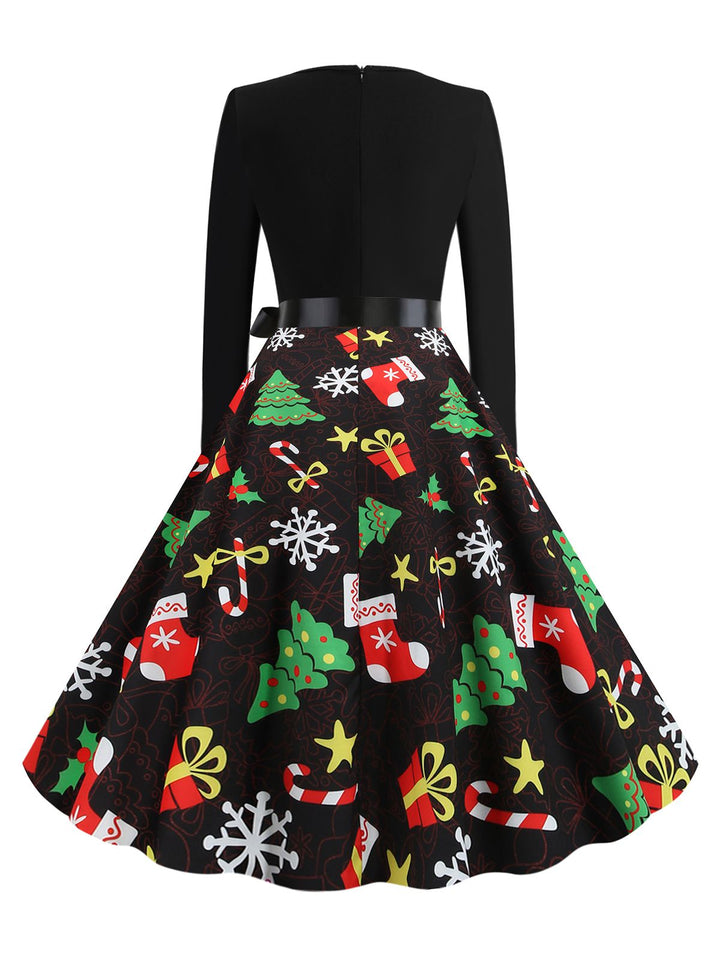 This Black 1950s Christmas Gift Tree Belted Dress wraps her in 1950s elegance, one twirl at a time