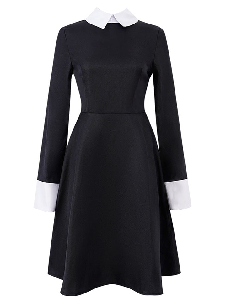 She slips into this Black 1950s Color Block Moderate Dress and suddenly it&