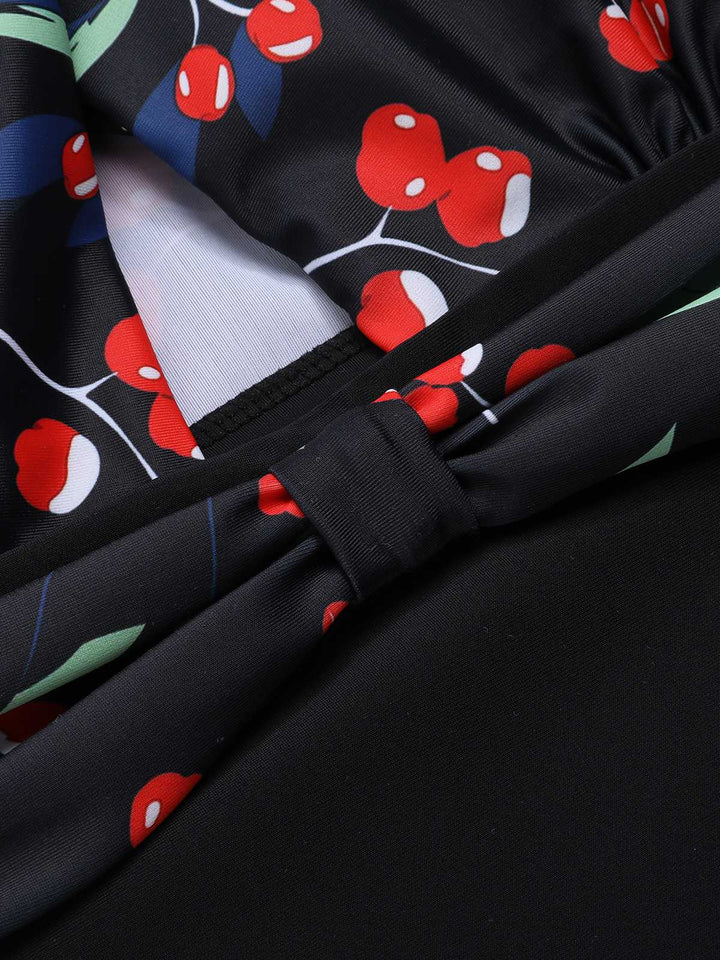 Black Cross Halter Cherry Swimsuit — poolside glamour meets sun-drenched confidence