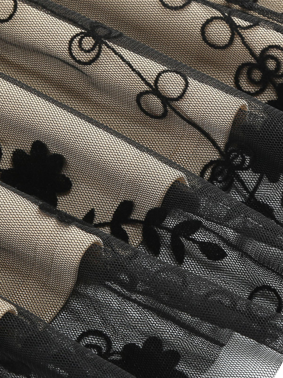 This Black 1950s Floral Mesh Patchwork Dress wraps her in 1950s elegance, one twirl at a time