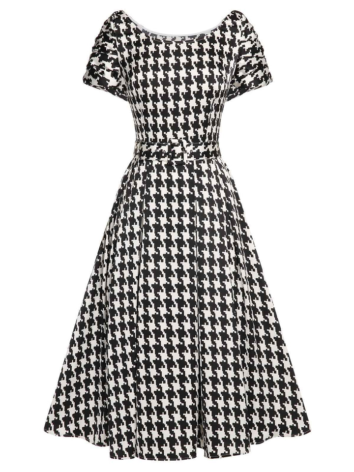 Black 1950s Houndstooth Short Sleeve Belted Dress — vintage elegance for the modern woman