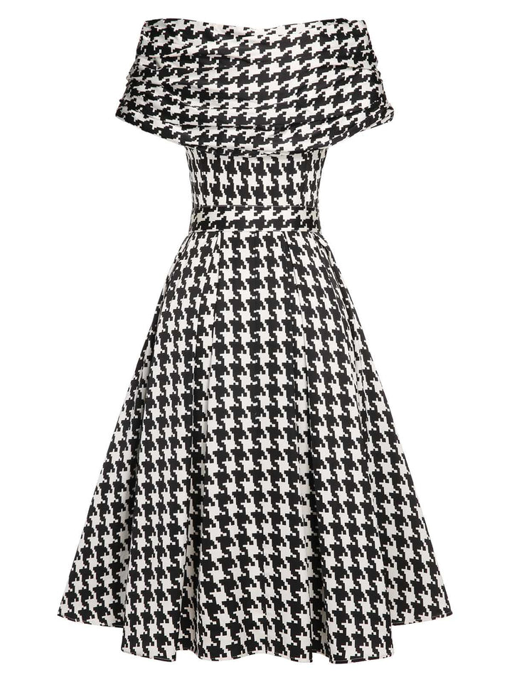 Black 1950s Houndstooth Short Sleeve Belted Dress — vintage elegance for the modern woman