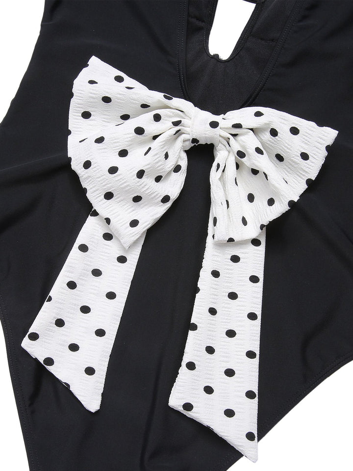 Black 1950s Polka Dot V-Neck Bow Swimsuit, vintage swimsuit, pin-up swimwear - perfect for women who love vintage and retro fashion
