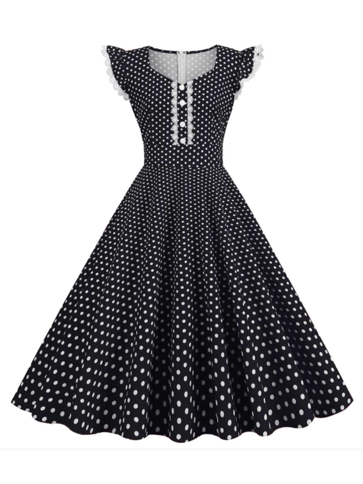 She slips into this Black 1950s Polka Dots Ruffles Dress and suddenly it&