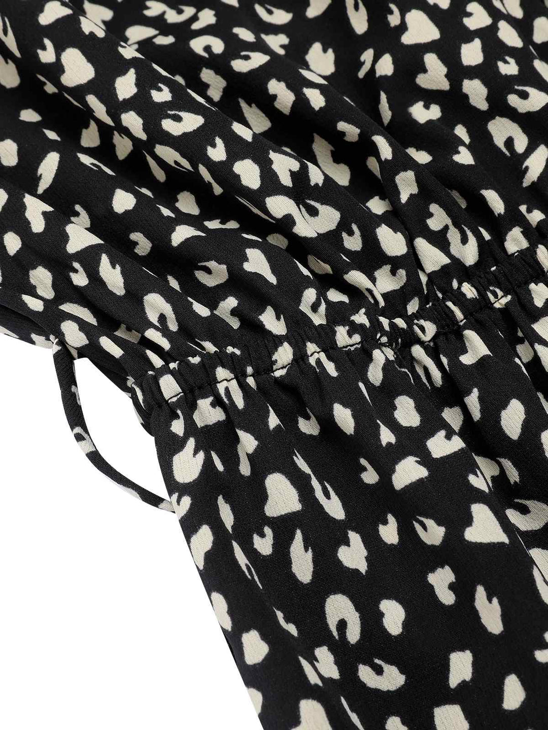 Black 1950s Printed V-Neck Belted Romper: timeless style reimagined