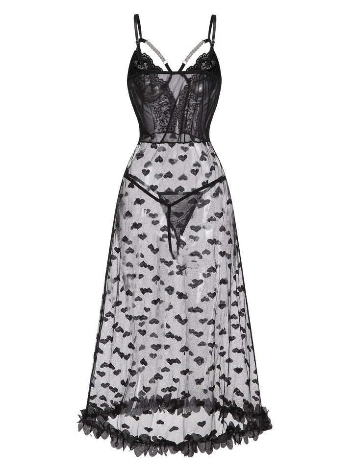 This Black Spaghetti Strap Heart Lace Nightgown wraps her in elegance, one twirl at a time