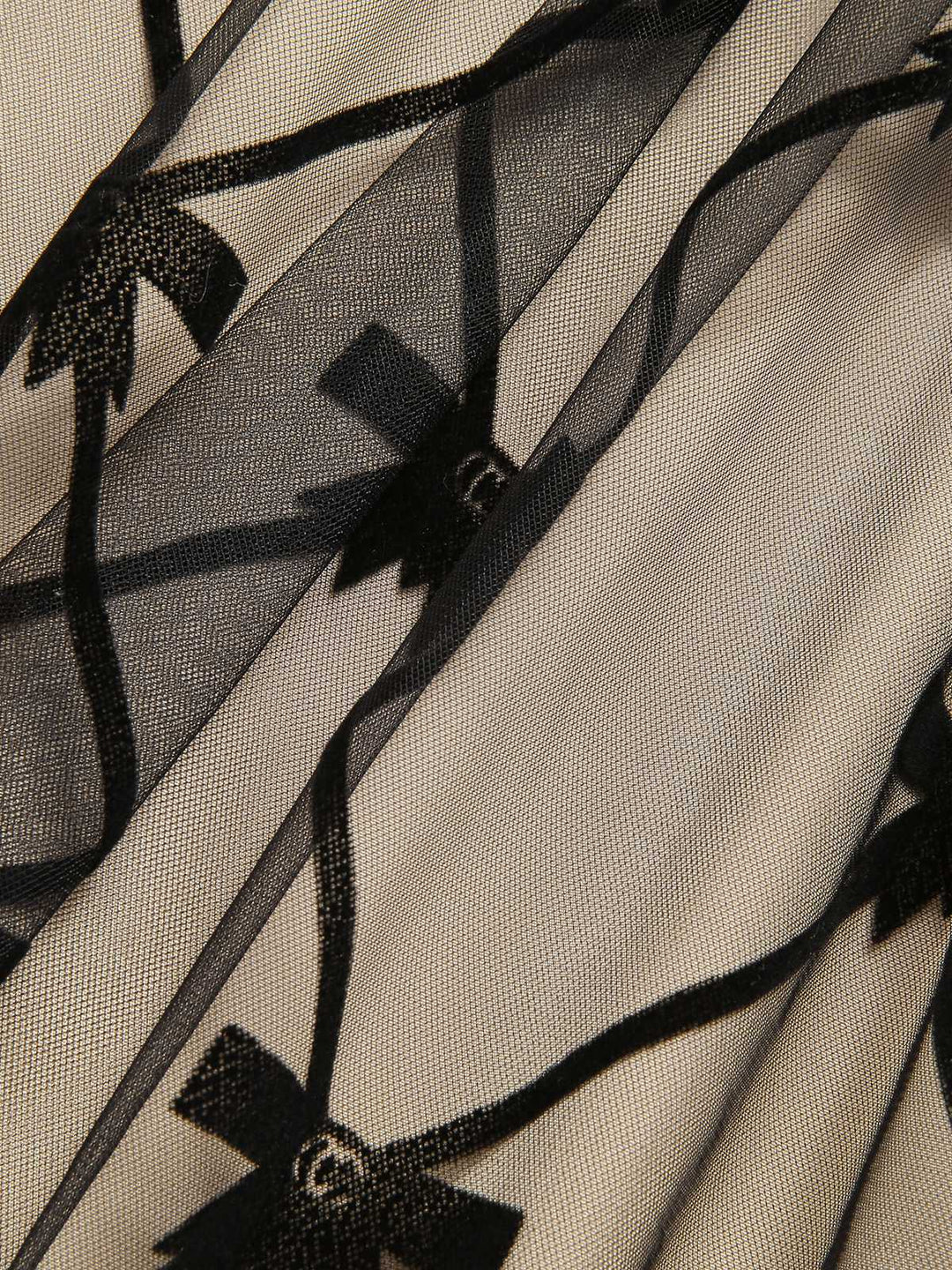 She slips into this Black 1950s V-Neck Bow Mesh Dress and suddenly it&