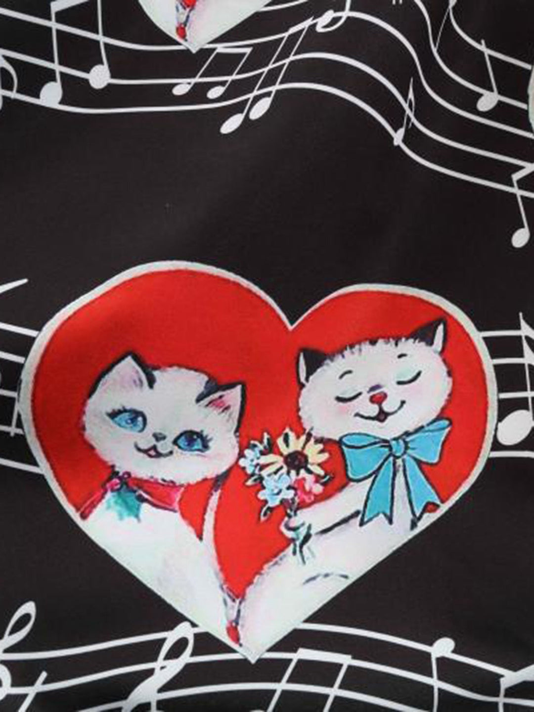 Black 1950s Valentine Cats &amp; Music Note Patchwork Dress — the kind of 1950s dress that makes strangers smile