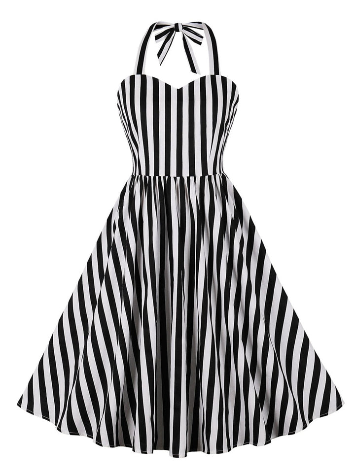 She slips into this Black 1950s Vertical Stripes Halter Dress and suddenly it&