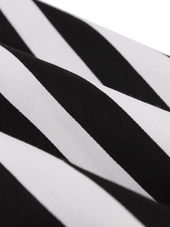Black 1950s Vertical Stripes Halter Dress — the kind of 1950s dress that makes strangers smile