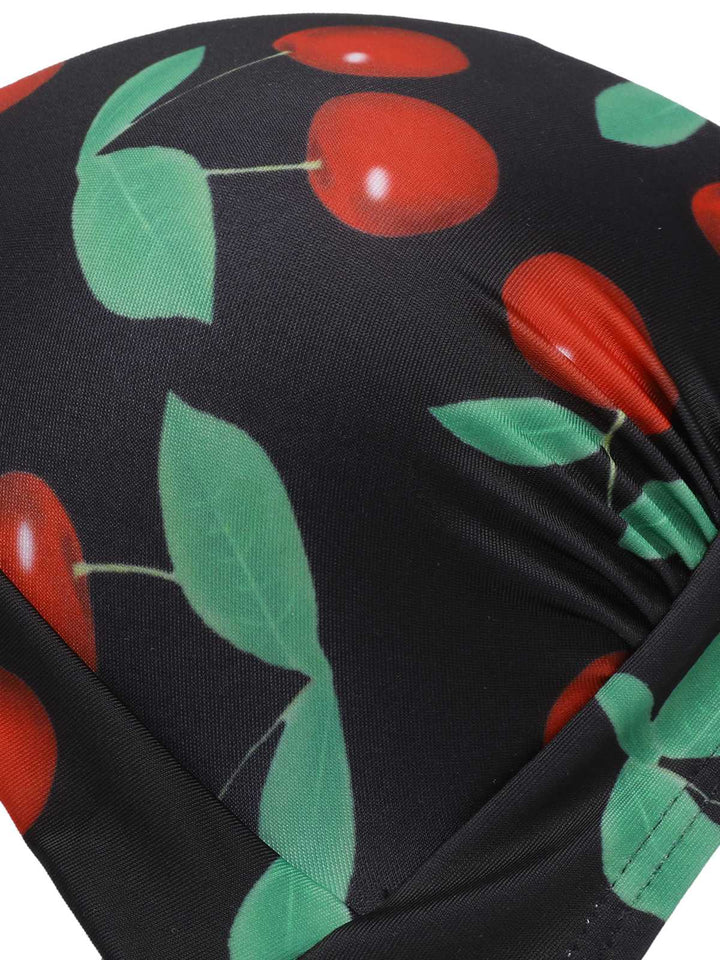 Black 1960s Halter Cherry Swimsuit — because 1960s glamour never goes out of style