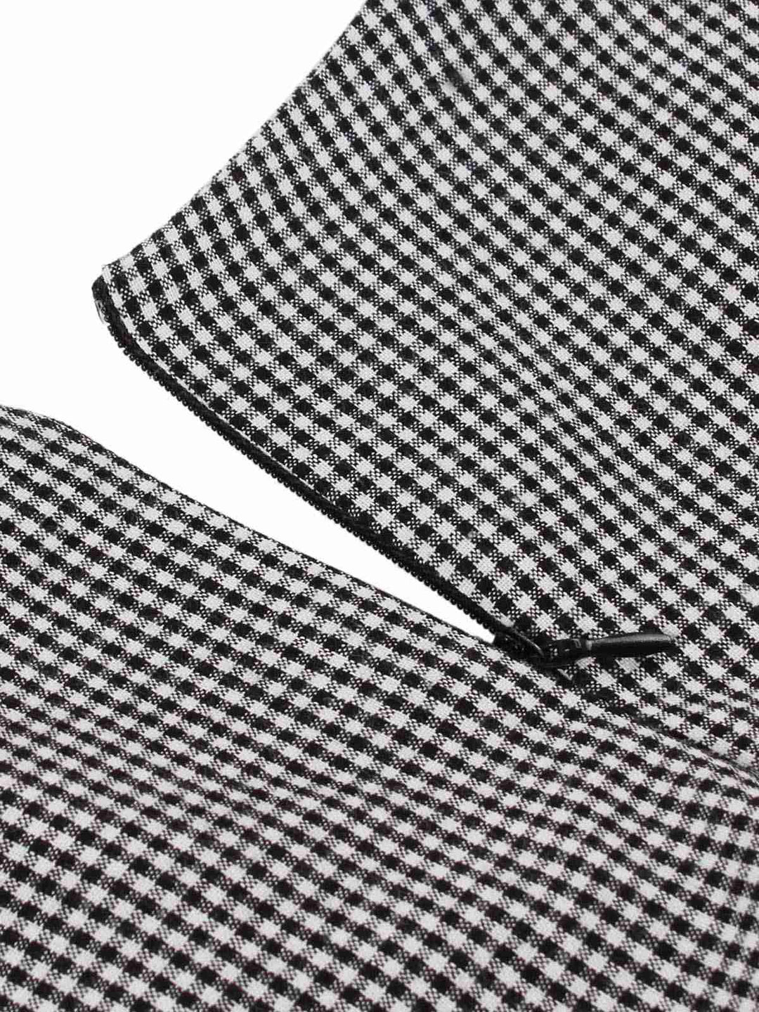 This Black 1960s Lapel Shepherd Check Patchwork Dress wraps her in 1960s elegance, one twirl at a time