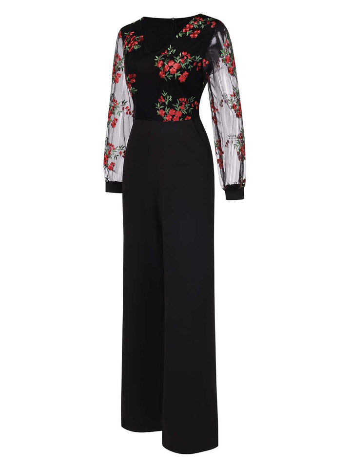 This Black 1970s Embroidered Floral Jumpsuit whispers 1970s secrets to those who notice