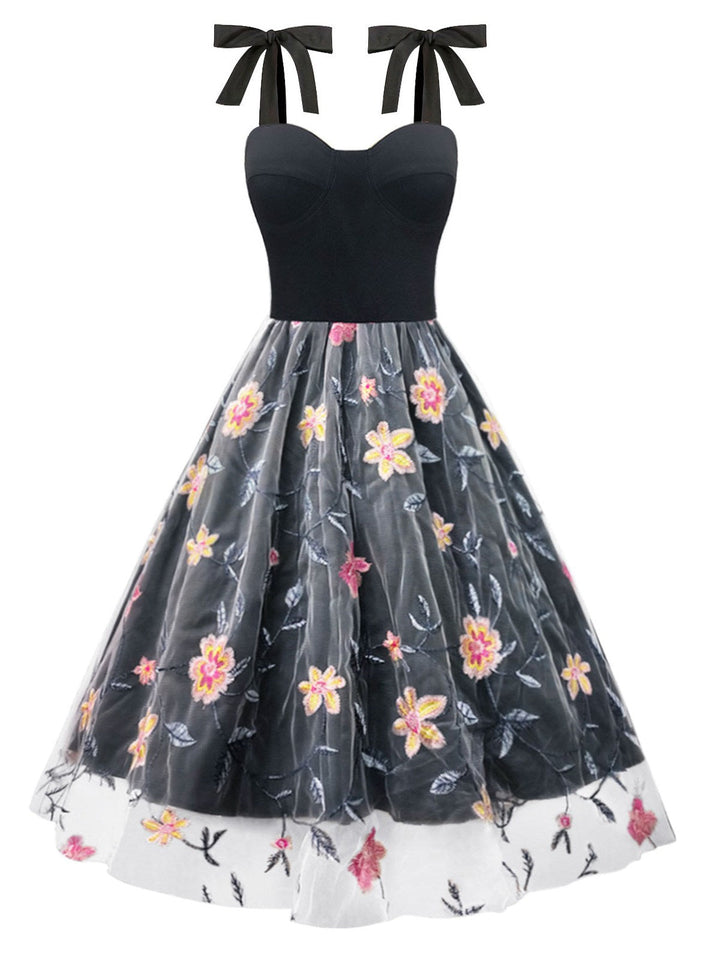 She slips into this Black 1970s Embroidered Floral Patchwork Mesh Dress and suddenly it&
