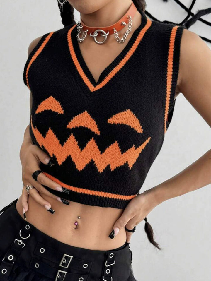 Black 1970s Halloween Pumpkin Face Sweater Vest, vintage fashion, retro style - perfect for women who love vintage and retro fashion